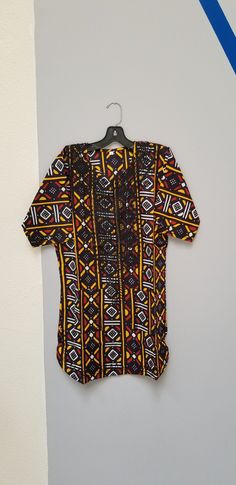 dashiki Casual Short Sleeve Batik Kaftan, Casual Short Sleeve Batik Print Kaftan, Casual Batik Print Kaftan, Traditional Multicolor Ankara Fabric Kaftan, Traditional Multicolor Ankara Kaftan, Traditional Black Cotton Agbada, Black Cotton Short Sleeve Kaftan, Casual Black Short Sleeve Kaftan, Multicolor Bohemian Kaftan In Ankara Fabric