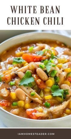 white bean chicken chili in a bowl with cilantro