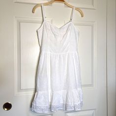 Very Cute White Eyelet Mini Dress. Never Worn. Purple Wrap Dress, Skort Dress, Low Back Dresses, Striped T Shirt Dress, Hollister Dresses, Lace Skater Dress, White Short Dress, Green Mini Dress, Silk Slip Dress