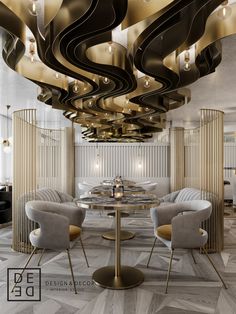 an elegant dining room with round tables and gold chandeliers hanging from the ceiling