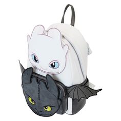 Flitter, flutter, and fly away with our Loungefly DreamWorks How to Train Your Dragon Furies Mini Backpack. Light Fury and Night Fury are featured on this backpack, which includes a textured faux leather to give the impression of dragon scales. At the top, Light Fury’s face rises up over this accessory, her facial features coming to life in embroidered detail. Below her, Night Fury appears on the front pocket in applique and embroidered detail. Both their wings stretch out on the sides, and Ligh Themed Cosplay Backpack, Dragon Light, Light Fury, Dragon Scales, Funny Gifts For Him, Night Fury, Train Your Dragon, Dragon Scale, Facial Features