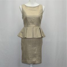 Nwot. Alice And Olivia Light Gold With Shimmer. Sleeveless Peplum Statement Dress, Has Exposed Zipper In The Back. Size 6. Very Sturdy Fabric. Never Worn. Perfect Holiday Party, New Year’s Eve, Wedding, Cocktail Or Formal Party! Reasonable Offers Through Offer Button! Can't Accept An Offer If You Don't Make One! I Offer Bundle Discounts!! No Trades Olivia Gold, Party New Year, Statement Dress, Alice And Olivia, Wedding Cocktail, New Year’s Eve, Exposed Zipper, Formal Party, Alice Olivia