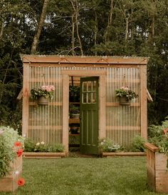 a garden shed with potted plants in it