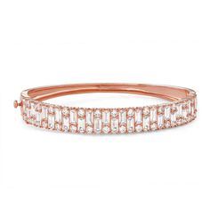 Finish off any ensemble with a touch of sparkle in this cubic zirconia-embellished 14k rose gold plated bangle bracelet. Click on this JEWELRY & WATCHES GUIDE to learn about fit, styles, materials and more! Finish off any ensemble with a touch of sparkle in this cubic zirconia-embellished 14k rose gold plated bangle bracelet. Click on this JEWELRY & WATCHES GUIDE to learn about fit, styles, materials and more! FEATURES Length: 7.25 in. Nickel safe Metal: sterling silver Plating: 14k rose gold Fi Fine Jewelry Rose Gold Diamond Bracelet With Baguette Cut, Rose Gold Baguette Cut Diamond Bracelet, Fine Jewelry Rose Gold Bangle With Cubic Zirconia, Rose Gold Cubic Zirconia Tennis Bangle Bracelet, Rose Gold Cubic Zirconia Diamond Bangle, Rose Gold Bracelets With Baguette Diamonds, Rose Gold Baguette Cut Bracelets For Wedding, Rose Gold Baguette Cut Bracelet For Weddings, Baguette Cut Rose Gold Bracelets For Wedding