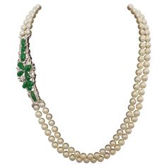 Jade Diamond and Pearl Strand Necklace Circa 1950's We Tried To Count The Ways This Can be Worn and Lost Count! 11 Fancy Shaped Cabochon Jadeites 70 Round Brilliant Cut Diamonds Weighing .70 Carats Approximately 123 Round Cultured Pearls. 7 - 7.5 mm The Pearls Un screw to make 3 Strand Formations 18.50 inches, 19.00 inches and 37.5 Inches as A Opera Length Strand. The Jade Pendant Articulated From Behind to Lay Comfortably On the Neck. Luxury Fine Jewelry With Round Beads, 1stdibs Jewelry, Pearl Strands Necklace, Pearl Strand, Star Sapphire, Pearl Strands, Jade Pendant, Multi Strand Necklace, Dream Jewelry