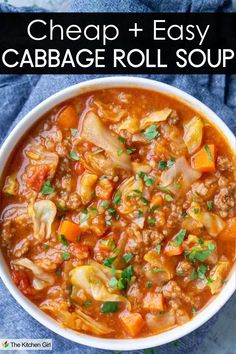 A bowl of cabbage roll soup filled with cabbage, carrots, and ground meat, garnished with chopped herbs. The image has text saying Cheap + Easy CABBAGE ROLL SOUP at the top.