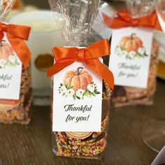 there are many candy bags with tags on them that say thank you and pumpkin for you