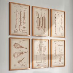 four framed drawings of kitchen utensils hang on the wall