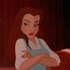 ariel from the little mermaid with her arms crossed in front of her chest, looking at something