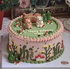 there is a cake decorated with two dogs on it