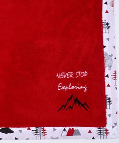 a red towel with the words never too explency written in white on it