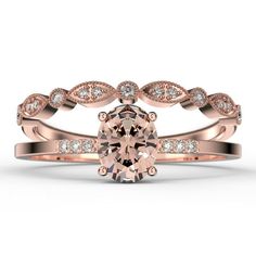 a rose gold engagement ring set with an oval cut diamond in the center and two rows of diamonds on each band