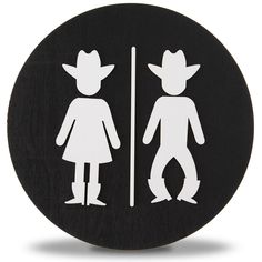 a black and white image of a man and woman in cowboy hats standing next to each other