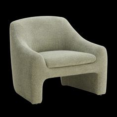 an upholstered chair is shown against a black background