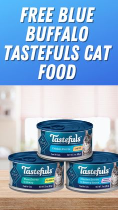 three cans of blue buffalo tastefuls cat food on top of a wooden table