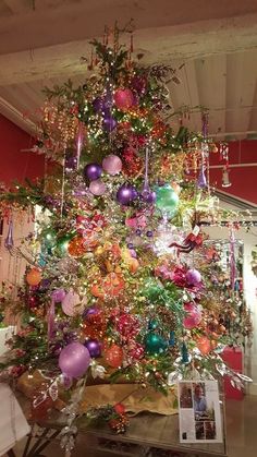 a christmas tree decorated with ornaments and lights