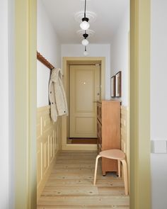 the hallway is clean and ready to be used as a dressing room or office area