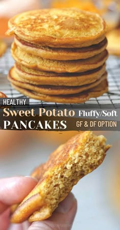 a stack of pancakes sitting on top of a cooling rack next to a hand holding a piece of bread