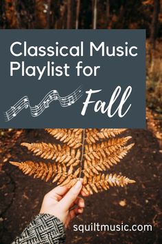 a hand holding a fern leaf with the words classical music playlist for fall