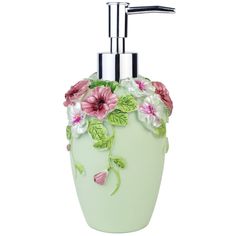 a soap dispenser with flowers painted on it