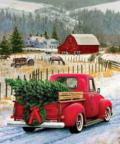 an old red truck carrying a christmas tree