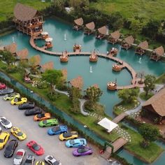 a parking lot filled with lots of different colored cars