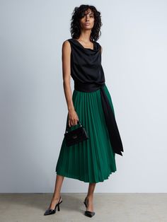 Pleated High Rise Midi Skirt | NY&Co Chic Asymmetrical Pleated Lined Skirt, Chic Asymmetrical Lined Pleated Skirt, Chic Pleated Asymmetrical Skirt For Party, Chic Asymmetrical Pleated Skirt For Party, Chic Green Pleated Lined Skirt, Chic Green Lined Pleated Skirt, Chic Green Midi Pleated Skirt, Chic Green Pleated Skirt, Chic Green Flowy Pleated Skirt