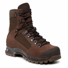 a pair of brown hiking boots on a white background