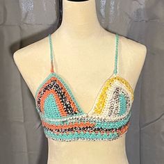 Painted Canyon Boho Beach Festival Halter Bikini Top Hand Crochet Xsmall/Small Waterproof Measurements Taken Flat Cup Mid Top2bottom 9” Bottom Width 13” Adjustable Ties 100% Acrylic Fitted Multicolor Crochet Swimwear, Orange Triangle Halter Top For Beachwear, Orange Summer Halter Top For Beach, Orange Halter Top For Summer Beach, Orange Halter Top For Beach In Spring, Orange Halter Top For Spring Beach Occasions, Striped Triangle Halter Top For Beach, Striped Triangle Halter Top For Vacation, Striped Halter Top For Beach Season