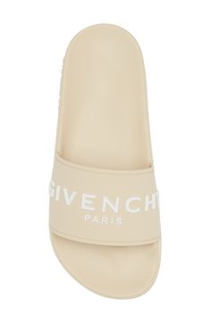 A bold Givenchy logo stamp crosses the wide strap of cushy, water-friendly sliders. Synthetic upper, lining and sole Made in Italy Women's Designer Shoes Designer Beach Slides With Cushioned Footbed, Logo Slip-on Sandals For Summer, Designer Slides With Branded Insole For Beach, Logo Open Toe Sandals For Summer, Designer Beach Slides With Branded Insole, Designer Slides For Summer, Summer Slip-on Sandals With Logo, Summer Beach Slides With Logo, Logo Open Toe Slides For Beach