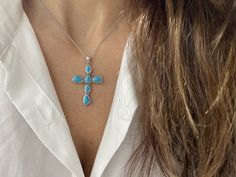 Turquoise Cross Pendant / Silver Large Turquoise Cross Necklace / Turquoise Cross Necklace / Large Cross Necklace / Layering Cross Necklace  FREE SHIPPING  WITHIN THE USA THIS LISTING IS FOR 1 TURQUOISE CROSS AVAILABLE WITH OR WITHOUT A CHAIN STERLING SILVER 925 NON TARNISH BEAUTIFUL HANDMADE TURQUOISE CROSS PENDANT  METAL: STERLING SILVER 925 STYLE: TURQUOISE STONES  PURITY: 925 SIZE: 38MM IN LENGTH WITHOUT THE LARGE LOOP AS IT IS WITH THIS ITEM ALL MY PIECES ARE HAND MADE. AND I STAND BEHIND E Handmade Turquoise Cross Necklace, Elegant Turquoise Cross Jewelry, Large Cross Necklace, Turquoise Cross Necklace, Turquoise Cross Pendant, Necklace Packaging, Turquoise Cross, Necklace Layering, Necklace Turquoise