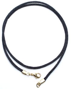 "This is a high quality satin silk cord necklace made from the finest materials. It is 2mm thick and comes in sizes 16\", 18\", 20\", 22\", 24\", 26\", 28\", 30\". Perfect for wearing on its own as a simple necklace, or use with your favorite pendant. This cord necklace is very comfortable and soft on the skin. You can wear it all day and forget you have it on. All of our cord necklaces are handmade in the USA." Adjustable Gold Necklace With Silk Cord, Adjustable Length Waxed Cord Necklace, White Waxed Cord Necklace - Perfect Gift, Nickel-free Waxed Cord Necklace - Ideal Gift, Cord Necklaces, Silk Cord Necklace, Black Cord Necklace, Necklace For Men, Silk Cord