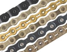 a close up of a bike chain on a white background with no people around it