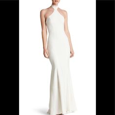 Off White Details & Care Deeply Cutaway Shoulders And A Wide Mock-Neck Collar Add A Contemporary Note To The Classic Halter Styling Of A Fluid-Crepe Mermaid Gown. 59 1/2" Center Front Length; 63" Back Length (Size Medium) Hidden Back-Zip With Ties Behind Neck Halter-Style Mock Turtleneck Cutaway Shoulders Full-Length Mermaid Skirt Lined 90% Polyester, 10% Spandex Dry Clean Made In The Usa Special Occasion No Flaws White Backless Dinner Dress, White Fitted Halter Neck Evening Dress, White Halter Neck Dress For Formal Occasions, White Fitted Halter Dress For Formal Events, White Halter Neck Formal Dress, White Fitted Halter Dress For Formal Occasions, White Fitted Dinner Gown, White Halter Neck Dress With Fitted Bodice, White Floor-length Gown For Dinner