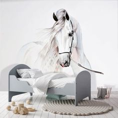 a white horse standing next to a bed in a room