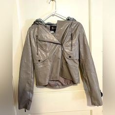 Joujou, Size M, Leather Hooded Jacket. Never Worn. Casual Gray Leather Jacket For Fall, Gray Long Sleeve Leather Jacket For Spring, Urban Gray Hooded Jacket For Fall, Casual Gray Leather Jacket For Winter, Gray Long Sleeve Biker Jacket For Winter, Casual Gray Biker Jacket For Winter, Casual Gray Biker Jacket For Fall, Brown Faux Leather Jacket, Tan Leather Jackets