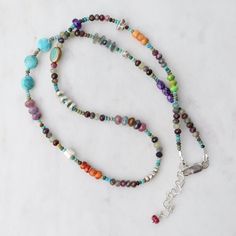 Riverstone Jewelry designer Jill Scholsohn creates vibrant jewelry using a mixture of amulets & talismans along with rare, exotic beads and mediums from sourced from several cultures spanning the globe. Turquoise, spiny oyster shell, 5mm ruby, sapphire, amethyst, apple coral, labradorite, crystal Sterling silver extender and lobster clasp 18-20" length All natural stones, slight variations in color will occur Handmade in CT Artisan Multi-stone Round Bead Necklaces, Bohemian Multi-stone Round Bead Jewelry, Fusion Style Multicolor Round Gemstones, Multicolor Round Fusion Gemstones, Handmade Adjustable Multicolor Gemstones, Multicolor Multi-stone Beads And Cabochons For Jewelry Making, Artisan Jewelry With Multi-stone Round Beads, Bohemian Multi-stone Round Bead Necklace, Fusion Style Multicolor Gemstone Beads Jewelry