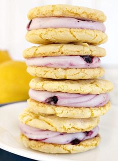 a stack of cookies sitting on top of a white plate