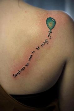 a woman with a tattoo on her shoulder that says, sometimes it's hard to fly