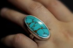 SIZE 7.5 Long Oval Kingman Turquoise Sterling Silver Ring | Etsy Modern Turquoise Jewelry For Everyday, Handmade Classic Oval Turquoise Ring, Modern Oval Turquoise Ring As Gift, Modern Oval Turquoise Jewelry, Modern Turquoise Oval Jewelry, Oval Turquoise Ring With Polished Finish, Modern Oval Turquoise Gemstone Ring, Untreated Adjustable Oval Turquoise Ring, Modern Turquoise Round Ring