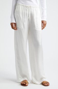 If you must step away from your pool chaise or beach towel, pop on some cotton pants closed with a comfy drawstring. Drawstring waist Front patch pockets 100% cotton Machine wash, line dry Imported Relaxed White Bottoms With Pockets, Relaxed White Wide Leg Bottoms, Comfortable White Trousers, White Vacation Bottoms With Side Pockets, Comfortable White Bottoms With Side Pockets, White Drawstring Beach Pants, White Bottoms With Side Pockets And Straight Hem, White Bottoms With Drawstring And Loosely Fitted Hips, Comfortable White Beach Pants