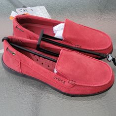 New True Red Spring Casual Loafers With Red Sole, Casual Red Slip-on Shoes, Casual Red Loafers For Spring, Casual Red Spring Loafers, Red Slip-on Moccasins For Spring, Casual Red Round Toe Slip-ons, Casual Slip-on Loafers With Red Sole, Casual Loafers With Red Sole And Flat Heel, Casual Loafers With Red Sole