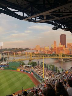 a baseball stadium filled with lots of people