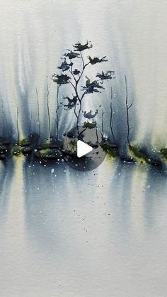 a painting with watercolors on it and an image of trees in the background