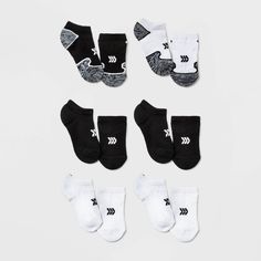 Why we?re ALL IN: These ankle-length athletic socks with moisture-wicking fabric help keep your child's feet dry and comfortable from any sports activity to a day at school. The arch support, reinforced heel and toe, and zone cushioning create the perfect functional fit and incredible feel for all of their active days. Plus, the black and gray color schemes with colorful and stripe accents make them easy to slip on with any of their athletic or everyday ensembles. When families come together to White Slip-resistant Training Socks, Black Non-slip Socks For Sports Events, Black Non-slip Socks For Sports, White Go-dry Socks For Training, Sporty White Moisture-wicking Socks, White Moisture-wicking Sporty Socks, White Moisture-wicking Gym Socks, Non-slip White Running Socks, White Non-slip Sporty Socks