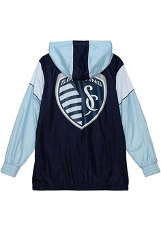 You'll be cozy as cheer on the Sporting KC in this Sporting Kansas City Navy Blue Pullover Jackets! This SKC HIGHLIGHT REEL ANORAK Pullover features a team color blocking on body with kangaroo pouch and team logo at left chest with team name on pouch. Wear your team spirit with pride in this Pullover Jackets even in the coldest weather! Go Sporting! Contrast color piping details on front body, hood, and sleeves, Fully lined in polyester mesh, Elasticized cuffs and waistband, Kangaroo Pocket, Scr Blue Crew Neck Outdoor Outerwear, Blue Crew Neck Outerwear For Outdoor, Outdoor Blue Track Jacket With Ribbed Cuffs, Blue Casual Windbreaker With Ribbed Cuffs, Blue Windbreaker With Ribbed Cuffs For Winter, Casual Blue Windbreaker With Ribbed Cuffs, Blue Varsity Long Sleeve Windbreaker, Blue Varsity Windbreaker With Long Sleeves, Blue Long Sleeve Windbreaker With Ribbed Cuffs