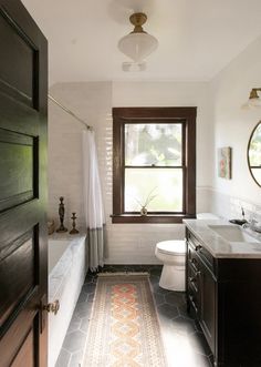 the bathroom is clean and ready to be used as a guest room or family room