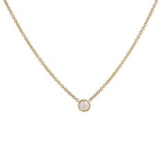 Our classic 14k gold pendant necklace features a solitaire round brilliant diamond, bezel set and suspended from a dainty chain - a subtle yet timeless sparkle from Gilded by G.St. Able to special order in rose or white gold- please allow 5 weeks for production and delivery. • 14k gold• 0.20ct round brilliant diamond (G-H color, SI clarity)• Spring ring clasp• Length: 16-17" All G.St collections are designed and crafted by us in NYC using recycled gold, conflict-free diamonds and responsibly sou Classic Diamond Necklace With Smooth Bezel, Classic Birthstone Necklace With Delicate Chain For Formal Events, Delicate Diamond White Necklace With Bezel Setting, Rose Gold Solitaire Necklace With Bezel Setting, Classic Diamond Birthstone Necklace With Bezel Setting, Classic White Gold Birthstone Necklace With Bezel Setting, Elegant 14k Gold Necklace With Smooth Bezel, Dainty White Gold Solitaire Necklace With Bezel Setting, Elegant 14k Gold Birthstone Necklace With Bezel Setting