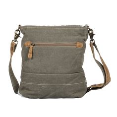 This crossbody bag have got ethnic look. Truly a multifunctional canvas crossbody bag having a front pocket and adjustable shoulder strap. More Information Materials Rug, leather & hairon Item Width 12 Item Height 13 Shoulder 26 Canvas Crossbody Hobo Bag With Zipper Closure, Casual Canvas Crossbody Bag With Leather Trim, Canvas Shoulder Bag With Adjustable Strap, Canvas Crossbody Shoulder Bag For Everyday Use, Everyday Canvas Shoulder Bag With Adjustable Strap, Everyday Canvas Crossbody Shoulder Bag, Daily Use Crossbody Shoulder Bag With Leather Trim, Crossbody Shoulder Bag With Leather Trim For Daily Use, Crossbody Canvas Bag With Leather Handles