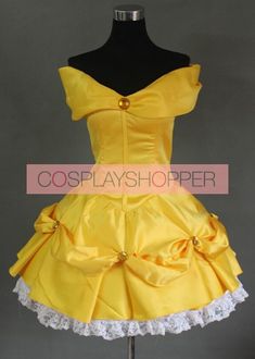 a yellow dress with ruffles on the bottom and white lace around the waist